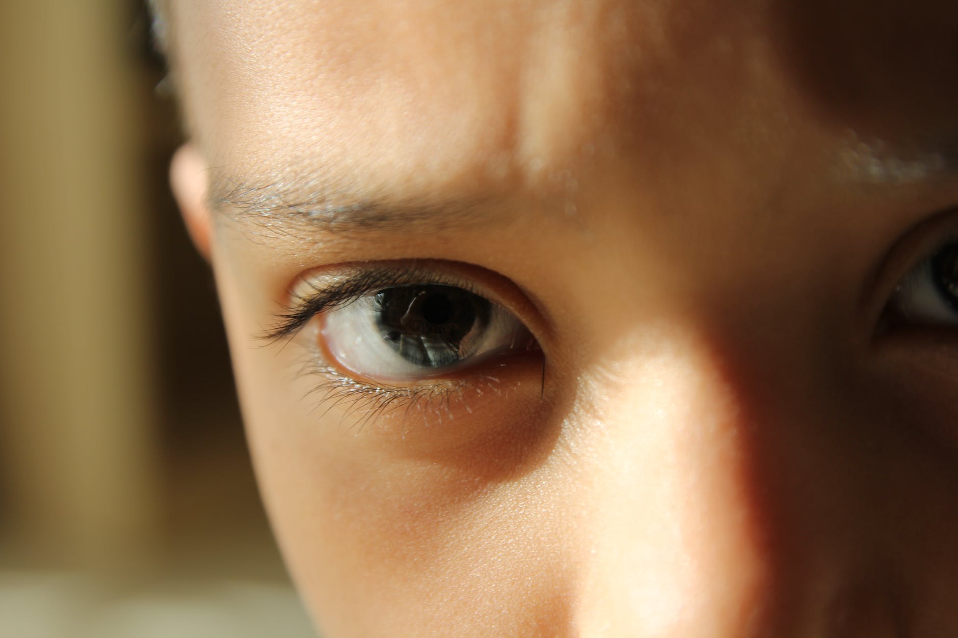 close up photo of kids eye